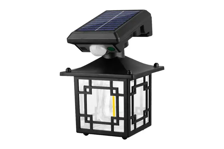 Черна соларна стенна лампа модел JD-1579 с PIR сензор за движение и топла LED светлина.